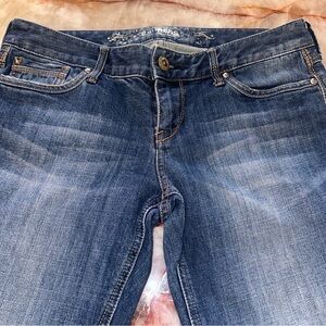 Express Denim Jeans in medium Blue. Cute rear pockets. 8R